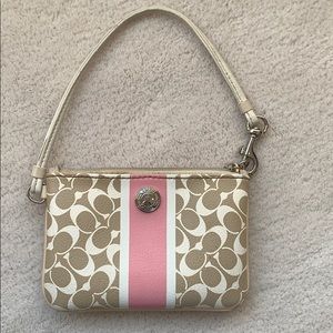 An adorable Coach wristlet